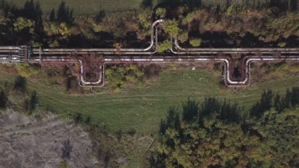 Aerial view of abandoned outdoor industrial heating pipeline — Stock Video