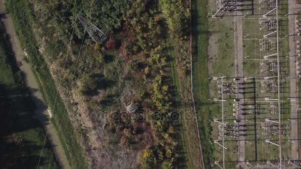 Aerial view of electricity power substation plant and pylons — Stock Video