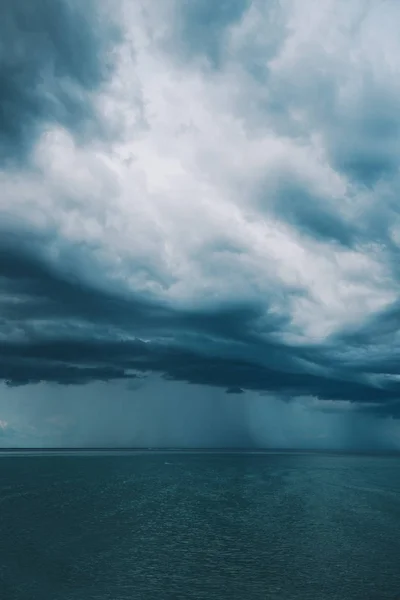 Stormy clouds over sea — Stock Photo, Image