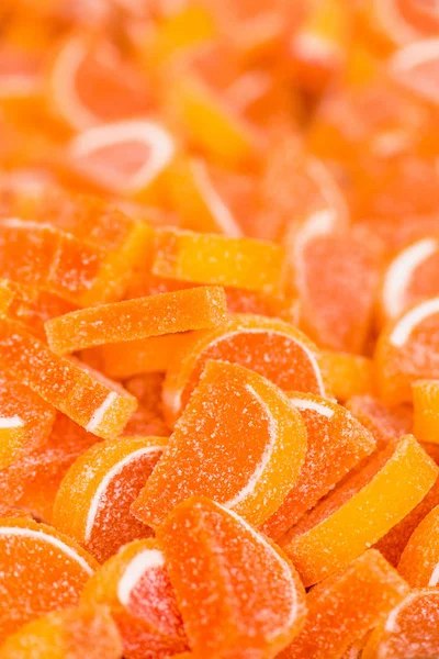 Pila de caramelo de azúcar naranja en el mercado callejero — Foto de Stock