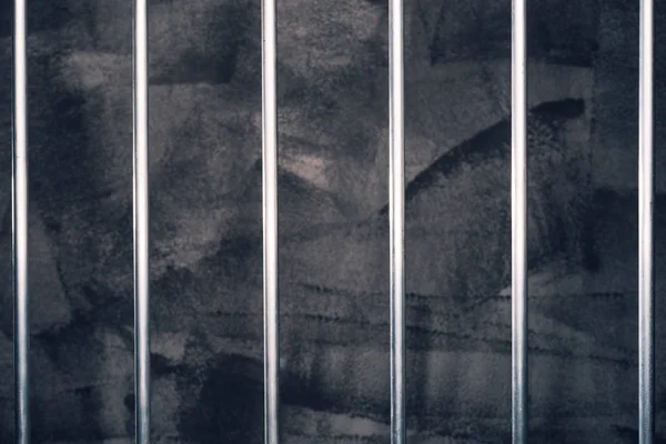 Jail bars, empty dark prison cell — Stock Photo, Image