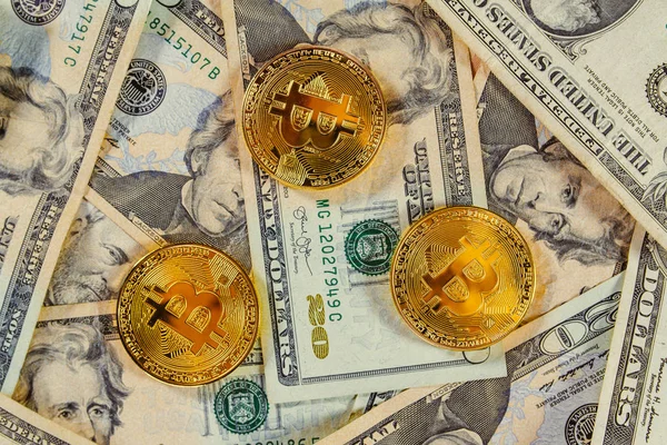 Bitcoins and dollars — Stock Photo, Image