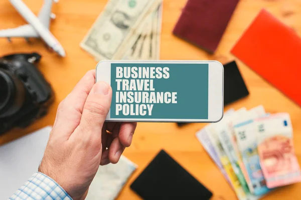 Business travel insurance policy online mobile app — Stock Photo, Image