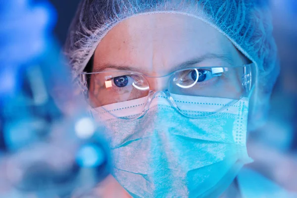 Scientist working with chemicals in laboratory — Stock Photo, Image