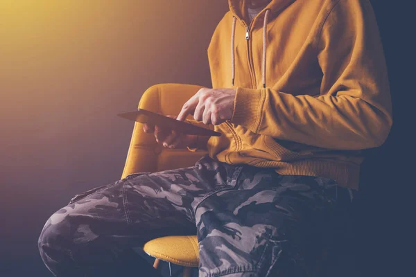 Casual man using digital tablet computer — Stock Photo, Image