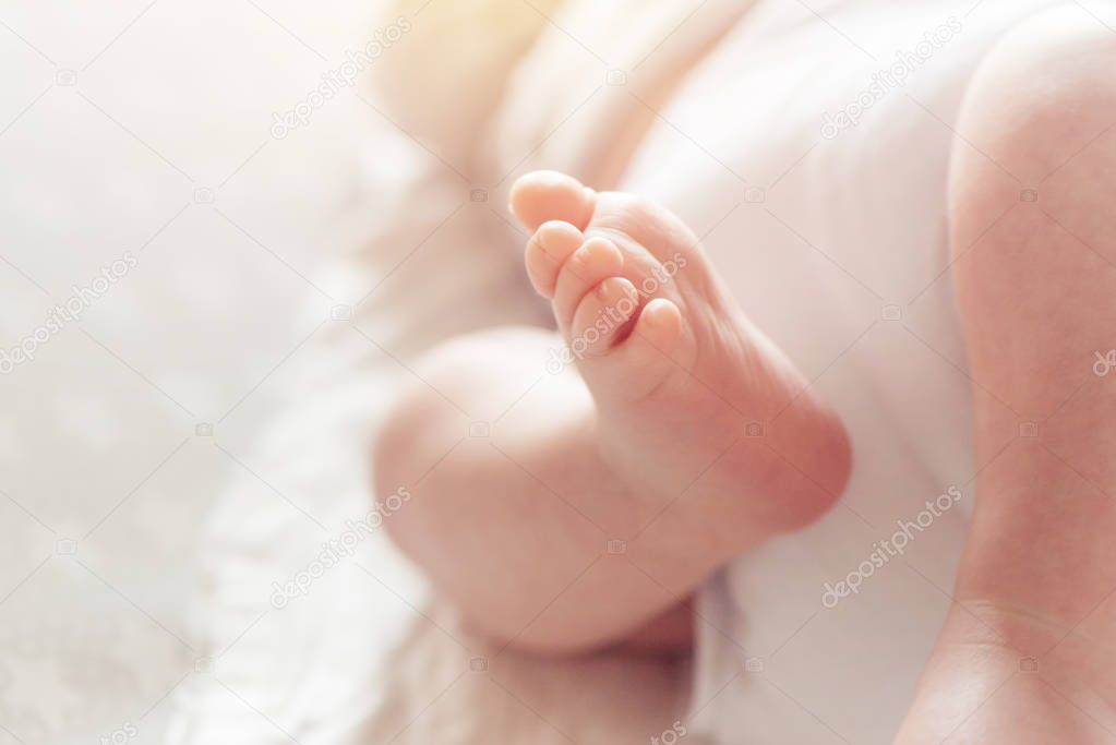 Close up of one month old baby boy foot