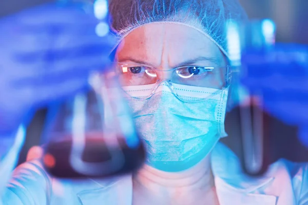 Scientist working with chemicals in laboratory — Stock Photo, Image