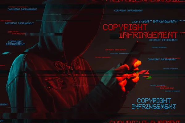 Criminal copyright infringement concept with faceless hooded mal — Stock Photo, Image