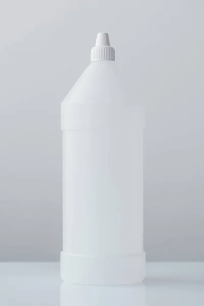 White plastic bottle container for medical ethyl alcohol