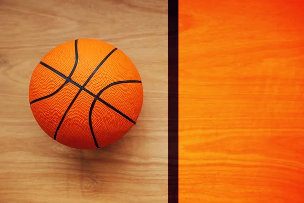 Basketball ball on court floor — Stock Photo, Image