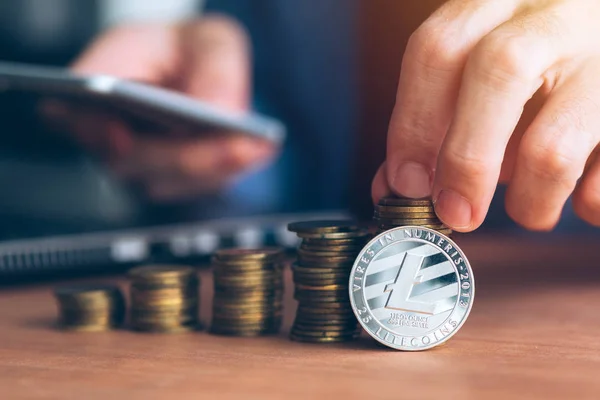 Litecoin cryptocurrency trader — Stock Photo, Image