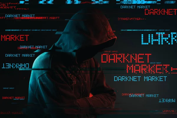 Концепция рынка Darknet с безликим мужчиной в капюшоне — стоковое фото
