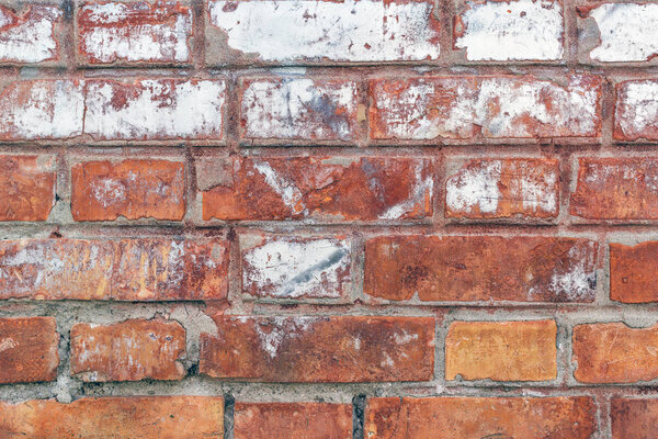 Brick wall grunge texture with scratch and distress marks as background