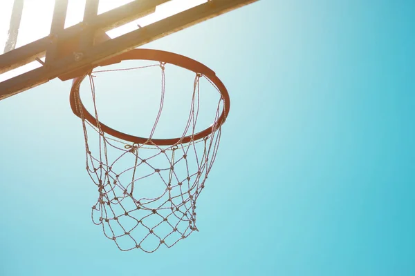 Basketball hoop with net, abstract minimalistic image with selective focus