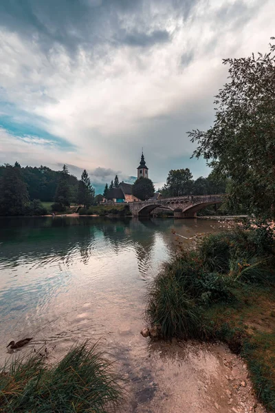 St. John the Baptist Church by the Lake Bohinj — Stock Photo, Image