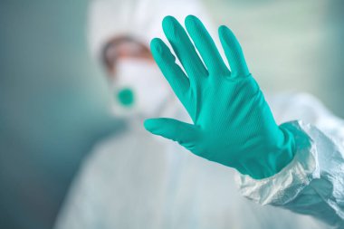 Epidemiyoloji uzmanı Coronavirus Quantin 'deki el işaretini durdur diyor.