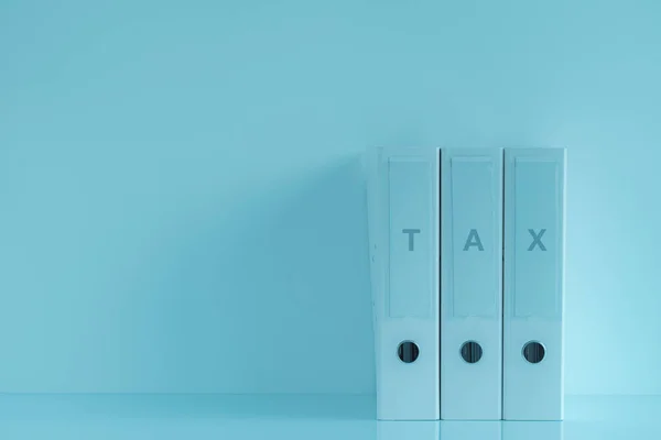 Три папки с кольцами для налоговых документов — стоковое фото