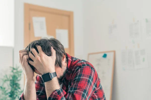 Disappointed Freelancer Home Office His Head Hands Selective Focus — Stock Photo, Image