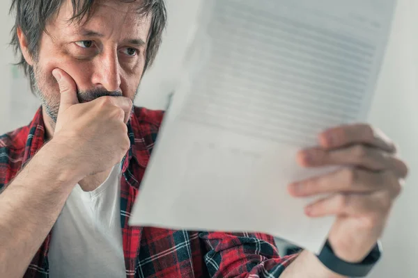 Worried Freelancer Reading Business Contract Terms Service Document Papers Home — Stock Photo, Image