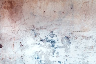 Yıpranmış kırsal duvarın dokusu soyut arkaplan olarak gösterilir