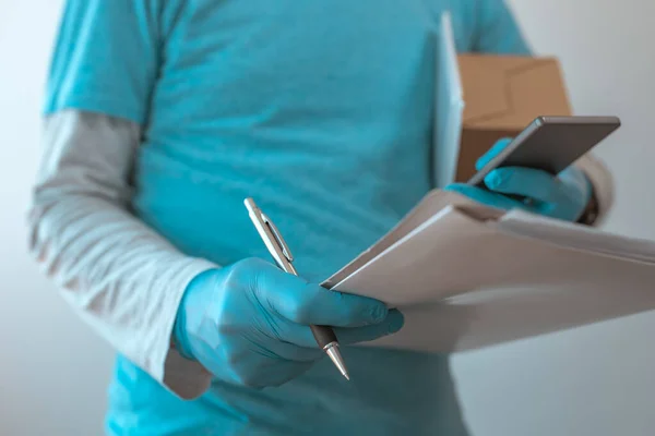 Delivery Man Protective Clothing Using Smartphone Protective Gloves Viral Infection — Stock Photo, Image