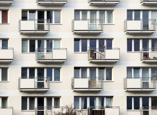 Fragment of residential block of flats with balconies
