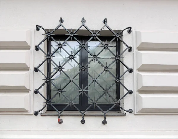 Window with decorative lattice — Stock Photo, Image