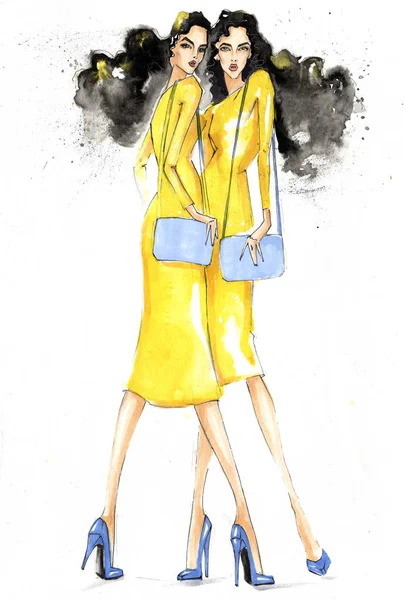 Due ragazze alla moda con borse in abiti gialli . — Foto Stock