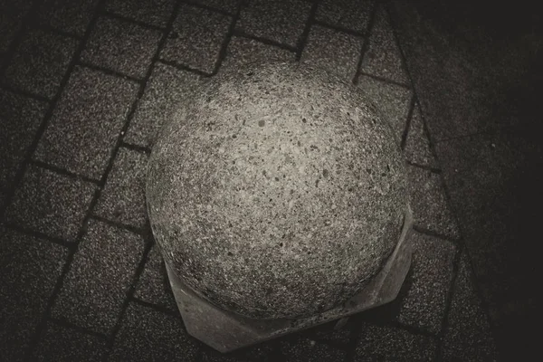 Cement ball on the ground — Stock Photo, Image