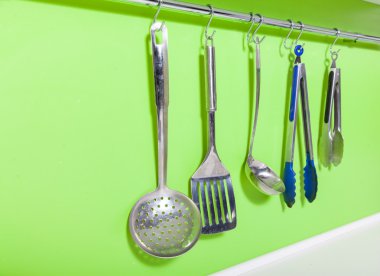 Cooking utensils on hanger clipart
