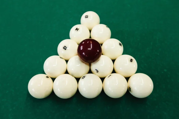 Cue balls on green table — Stock Photo, Image