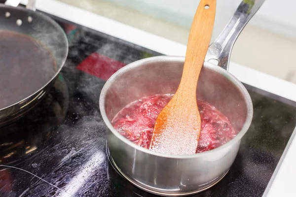 Boiling sauce in pot — Stock Photo, Image