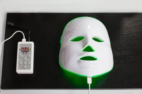 Light rejuvenating mask for skin therapy — Stock Photo, Image