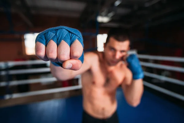Boxer in blue wrist wraps training — Stock Photo, Image