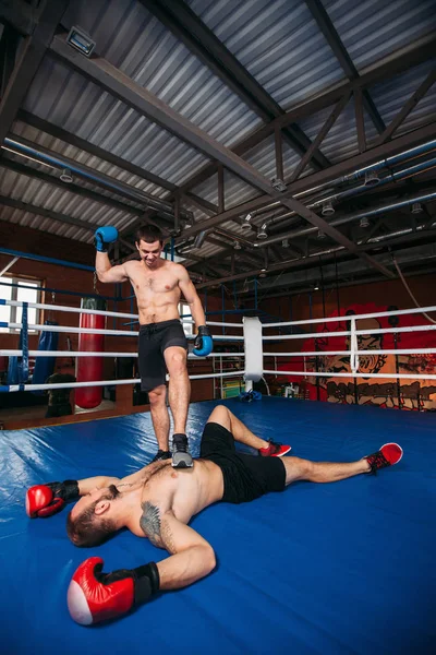 Boxer wins with knockdown — Stock Photo, Image