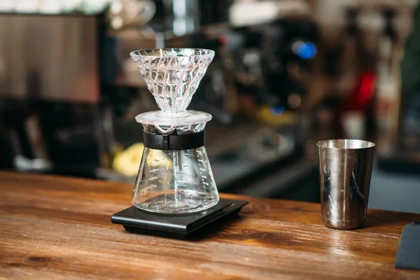 Cooking coffee in a glass pot — Stock Photo, Image