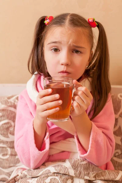Little girl drinking tea — Stock Photo, Image