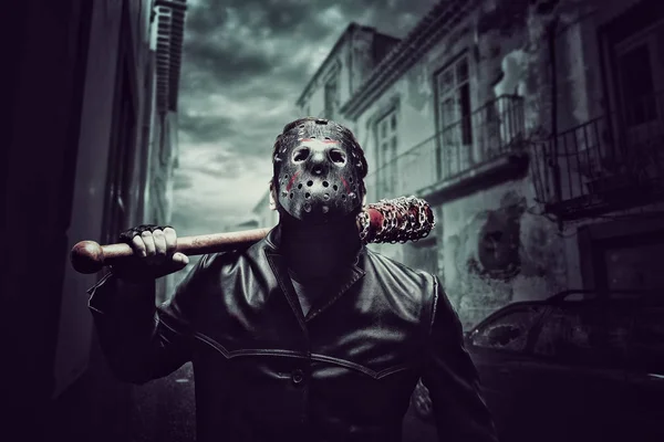 Psycho man in hockey masker — Stockfoto