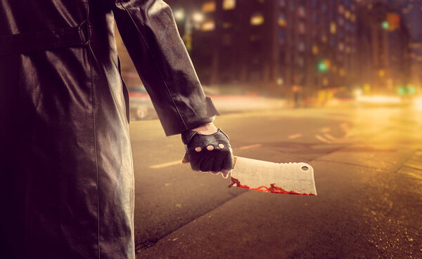 Killer holding meat cleaver in hand