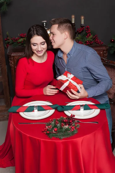 Young loving couple in restaurant — Stock Photo, Image