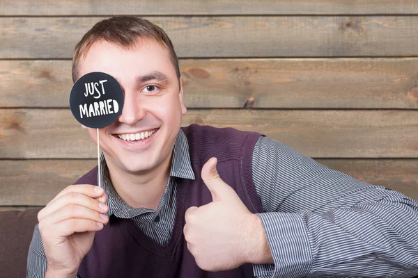 Young man with Just Married icon — Stock Photo, Image