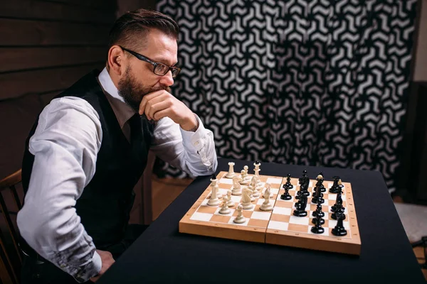 Pensive chess player — Stock Photo, Image