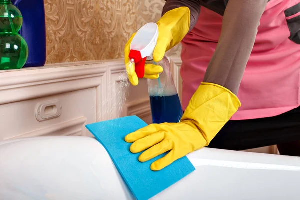 Woman in cleaning service uniform — Stock Photo, Image