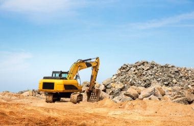 Excavation machine in a quarry clipart