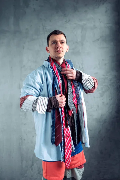 Man dressed in many clothes — Stock Photo, Image