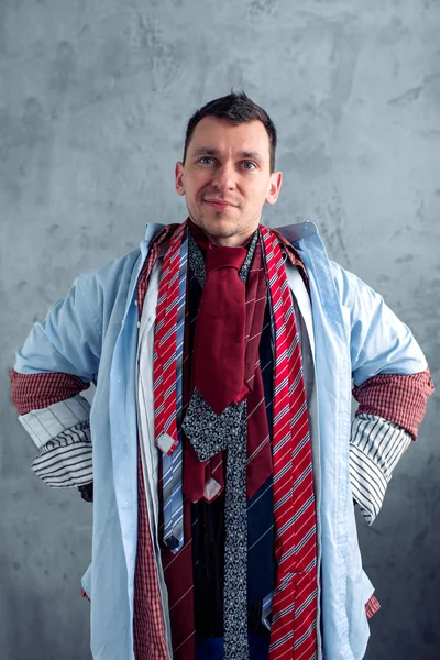 Man dressed in many clothes — Stock Photo, Image