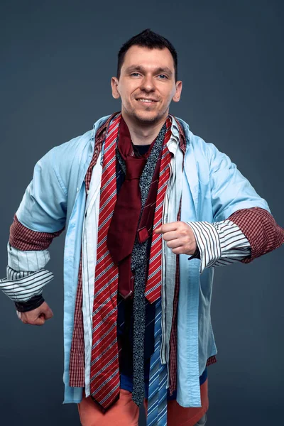 Man dressed in many clothes — Stock Photo, Image