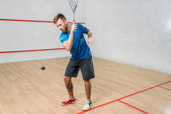 male squash player