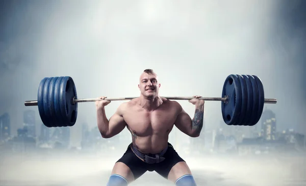 Muscular male athlete — Stock Photo, Image