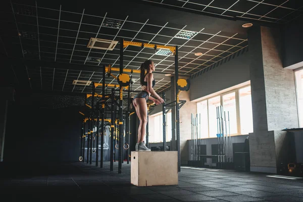 woman doing box jump exercise
